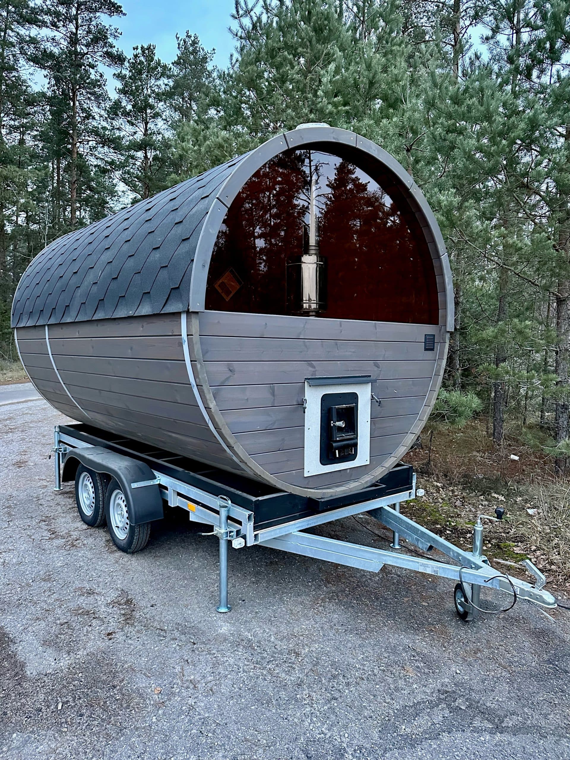 Mobile sauna trailer with panoramic glass front, ideal for a hire business
