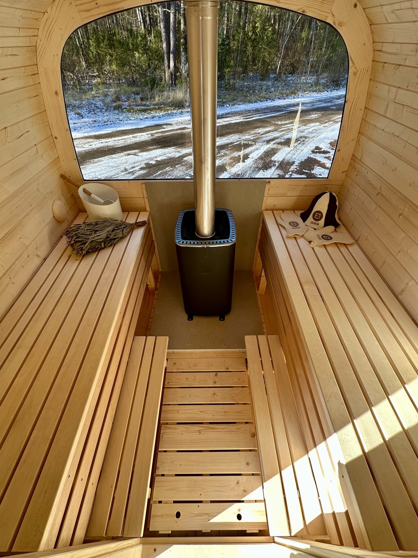 Mobile barrel sauna on trailer